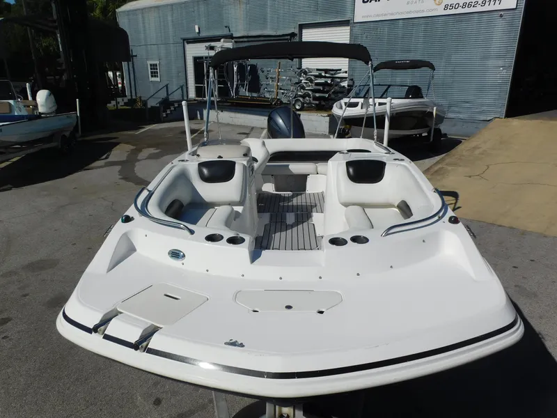 Slide: The Image of 2014 Hurricane Sport 188 boat with white interior and bimini top. - 5