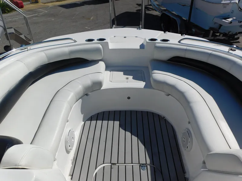 Slide: The Image of 2014 Hurricane Sport 188 boat interior with white seating and gray flooring. - 7