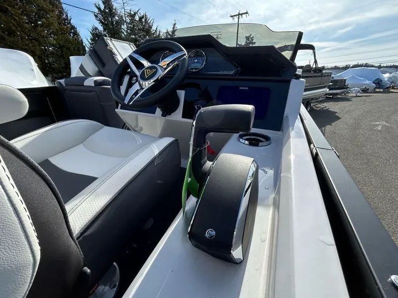 Slide: The Image of Viaggio d22q 2024 boat interior with steering wheel and control panel. - 10