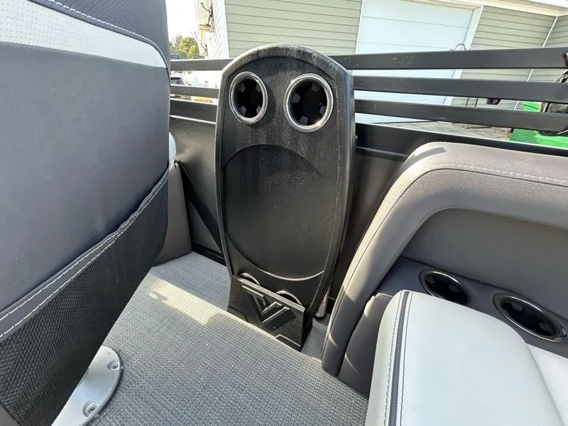 Slide: The Image of Interior of 2024 Viaggio d22q boat with cup holders and seating. - 14