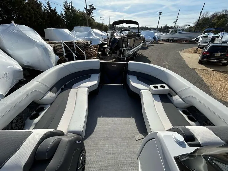 Slide: The Image of 2024 Viaggio d22q pontoon boat with spacious seating and modern design. - 16