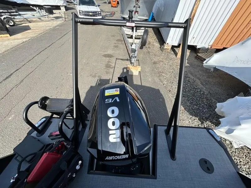 Slide: The Image of 2024 Viaggio d22q boat with Mercury 200 V6 outboard motor in a marina. - 18