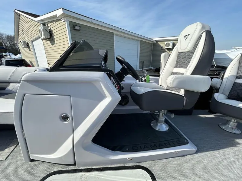 Slide: The Image of 2024 Viaggio d22q boat cockpit with captain's chair and control panel. - 6