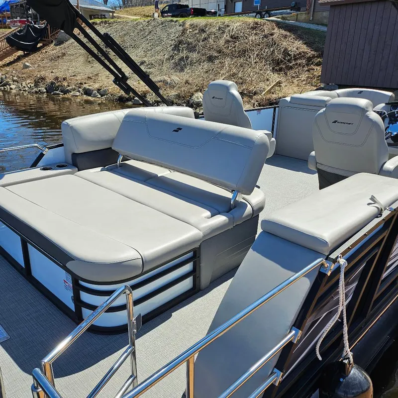 Slide: The Image of 2023 Starcraft SLS 5 Q DH boat interior with plush seating and modern design. - 6