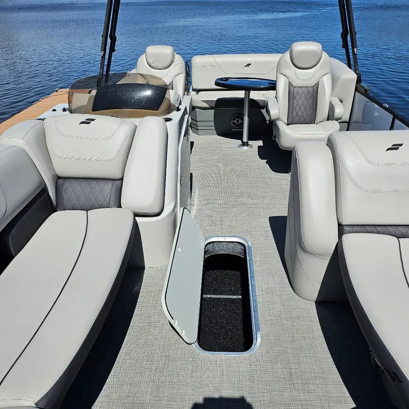 Slide: The Image of Luxurious interior of 2023 Starcraft SLS 5 Q DH boat with plush seating. - 8
