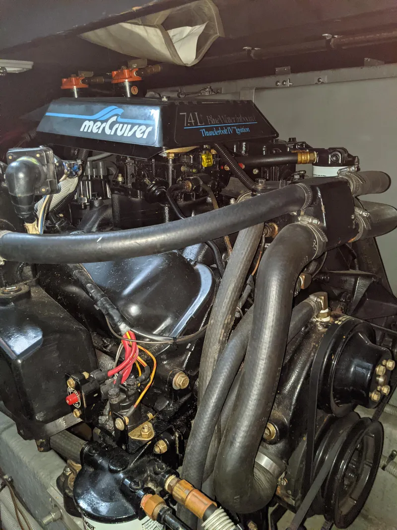 Slide: The Image of 1989 Sea Ray 380 Aft Cabin MerCruiser engine in the engine compartment. - 38