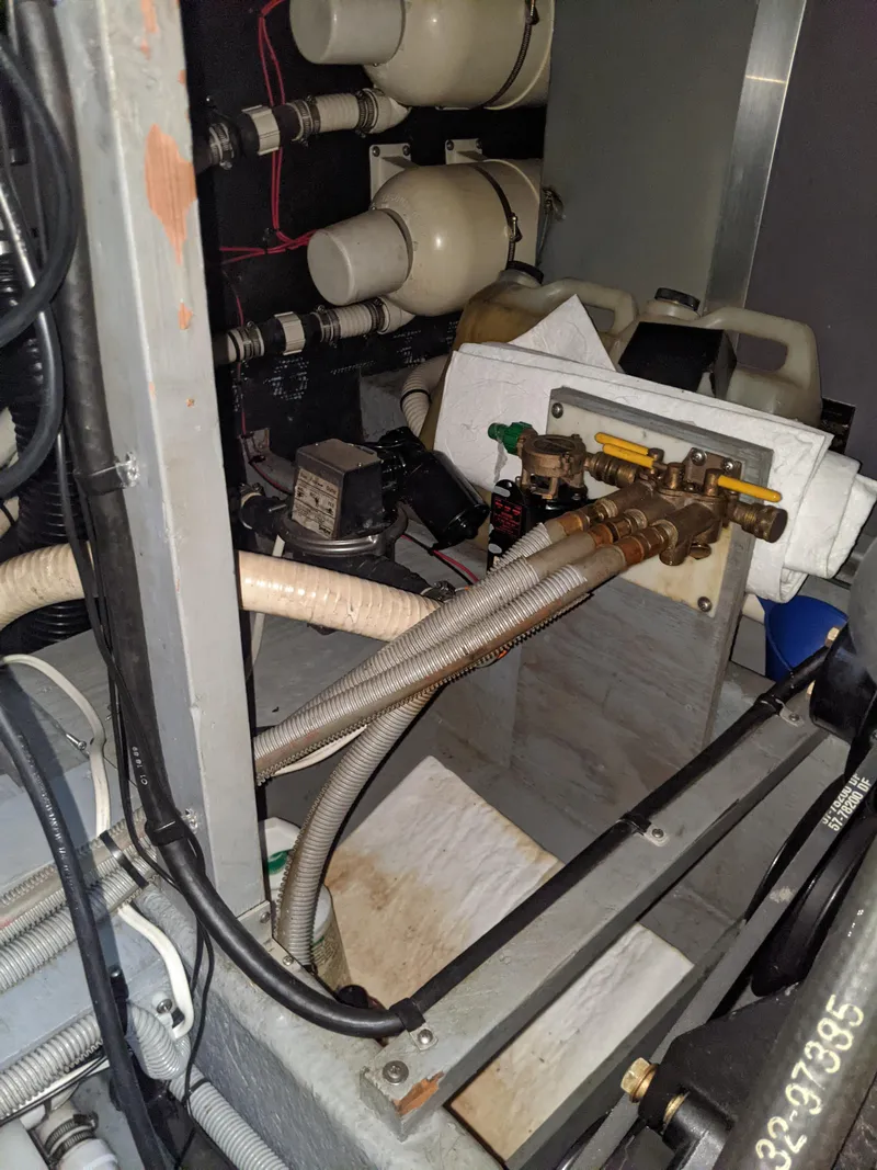 Slide: The Image of Engine compartment of a 1989 Sea Ray 380 Aft Cabin boat. - 44