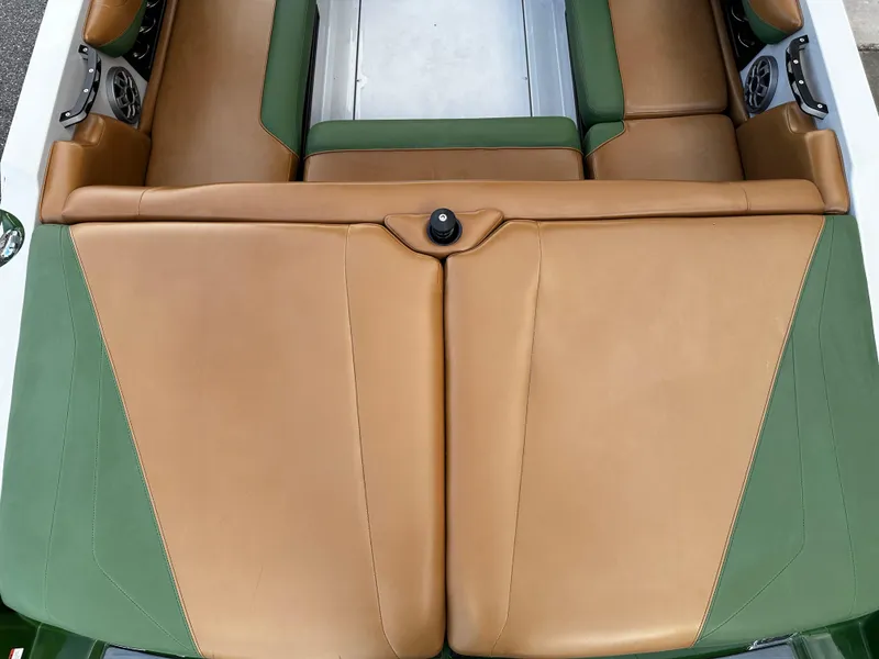 Slide: The Image of 2021 Axis T22 boat interior with tan and green upholstery. - 19