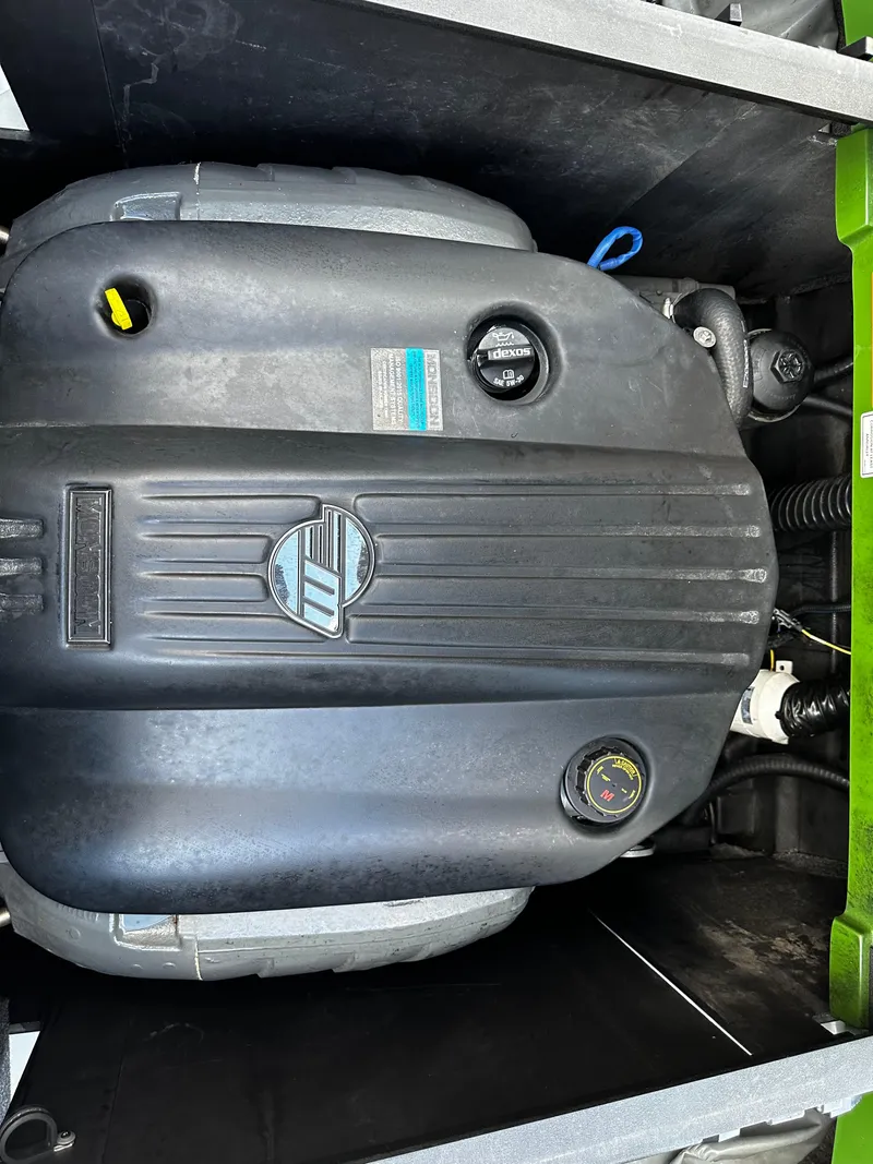 Slide: The Image of 2021 Axis T22 engine compartment with visible engine components. - 39