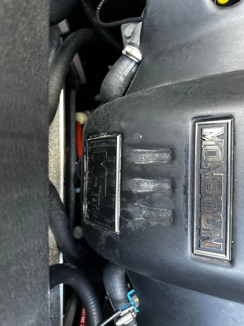 Slide: The Image of 2021 Axis T22 engine close-up showing Monsoon branding. - 40