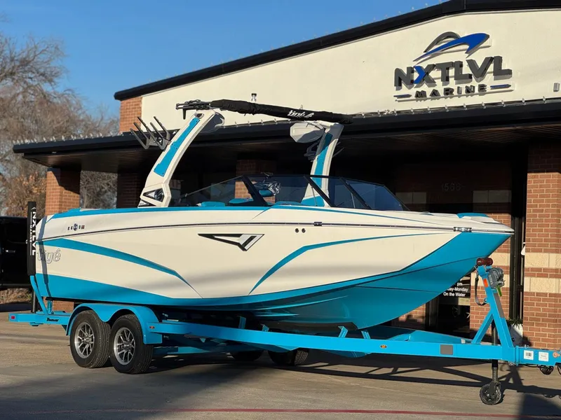 Slide: The Image of 2024 Tigé Z3 boat on trailer at NXT LVL Marine dealership. - 1