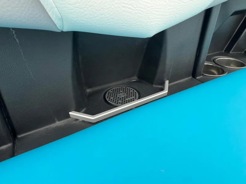 Slide: The Image of 2024 Tigé Z3 interior detail with speaker and cup holders. - 19