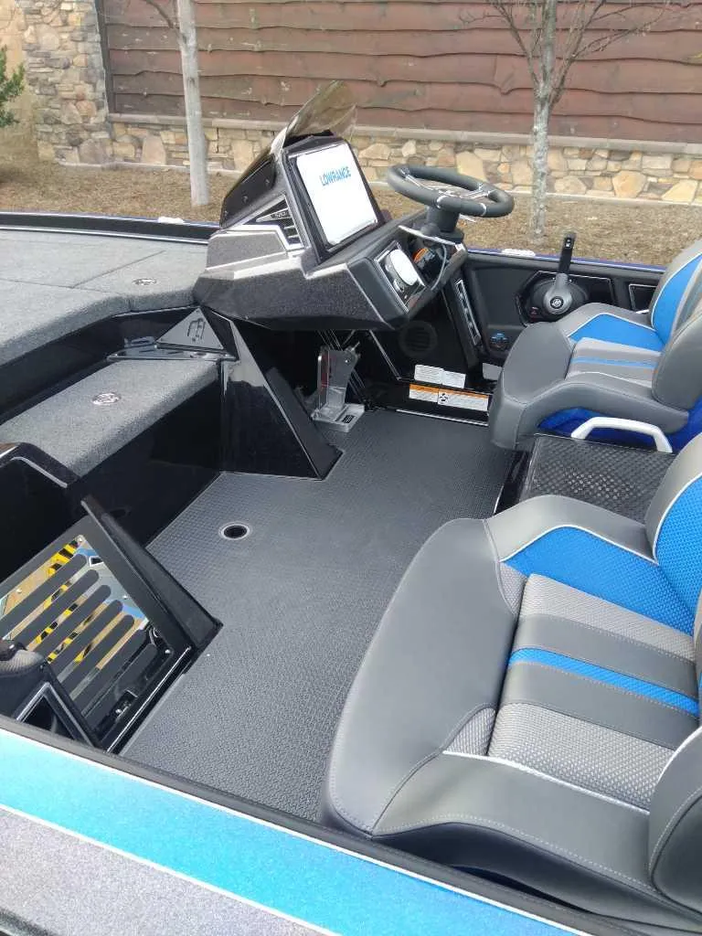 Slide: The Image of 2024 Ranger Z520R Ranger Cup Equipped boat interior with modern dashboard and seating. - 5