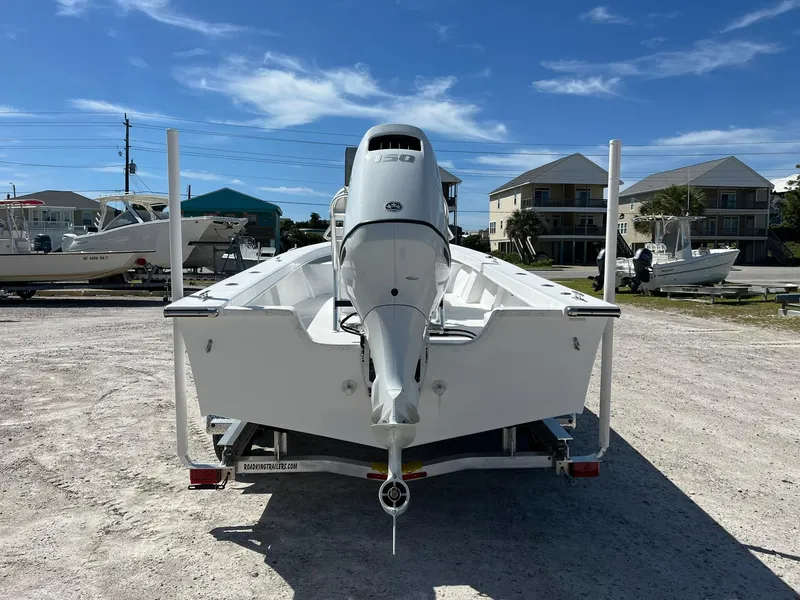 Slide: The Image of 2025 C-Hawk 23 Center Console boat on trailer, rear view, sunny day. - 4