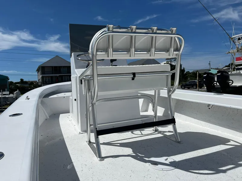 Slide: The Image of 2026 C-Hawk 23 Center Console boat on trailer, parked outdoors. - 11