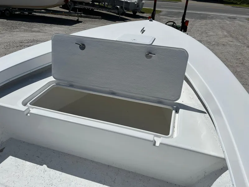 Slide: The Image of 2026 C-Hawk 23 Center Console boat with white seating and open deck. - 13