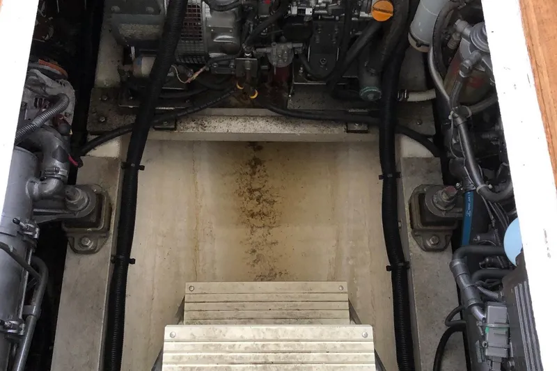 Slide: The Image of Engine compartment of a 2005 Morgan 31 boat. - 24