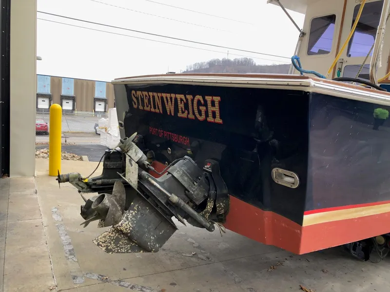 Slide: The Image of 2005 Morgan 31 boat named Steinweigh with damaged propeller in a repair shop. - 3