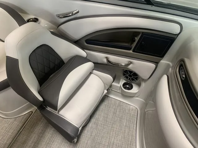 Slide: The Image of 2024 Crownline E255 boat interior with luxurious seating and modern design. - 17