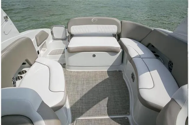 Slide: The Image of 2024 Crownline E255 boat interior with spacious seating and modern design. - 25