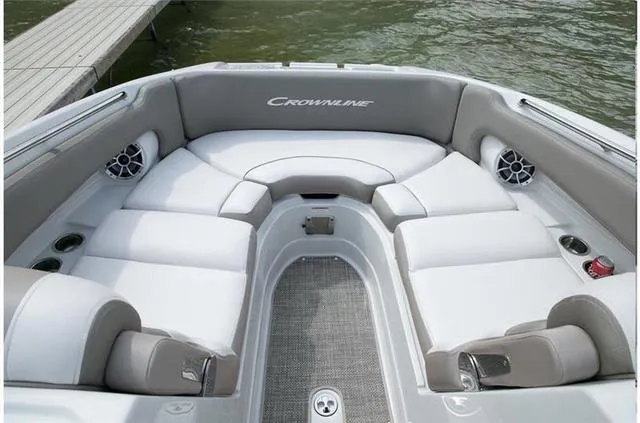Slide: The Image of 2024 Crownline E255 boat interior with spacious seating and modern design. - 27