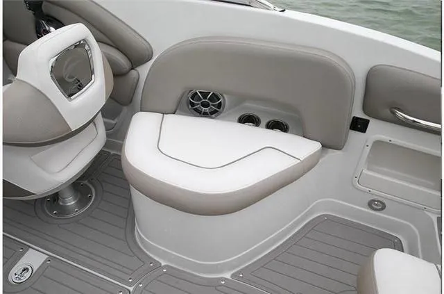 Slide: The Image of 2024 Crownline E255 boat interior seating and flooring. - 35