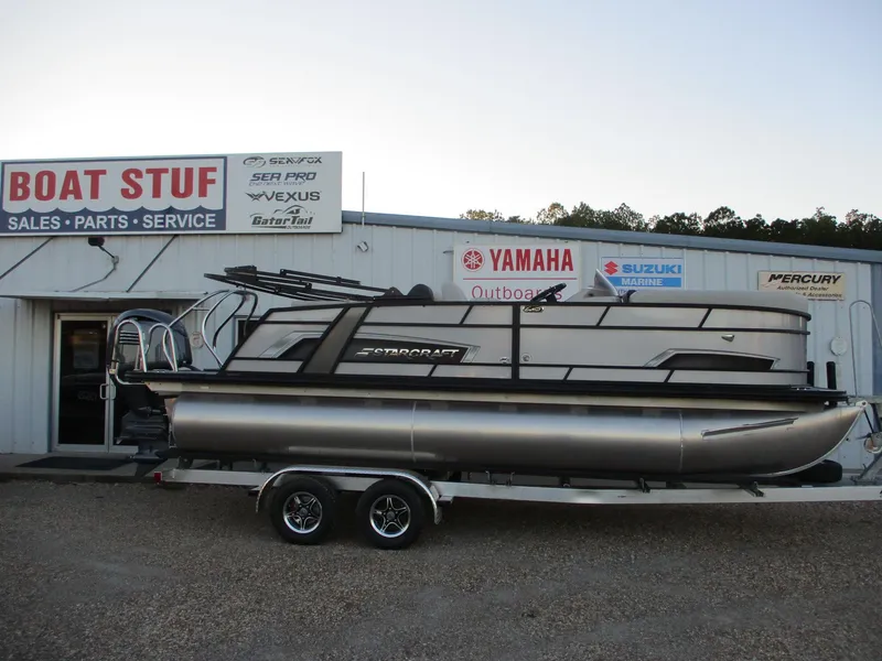 Slide: The Image of 2024 Starcraft EXS 1 Q DH pontoon boat at Boat Stuf dealership. - 0