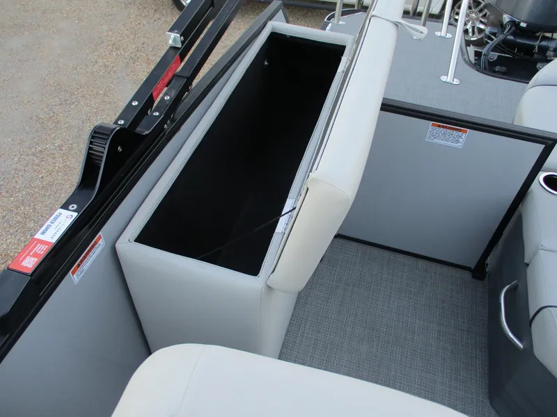 Slide: The Image of 2024 Starcraft EXS 1 Q DH boat interior storage compartment. - 12