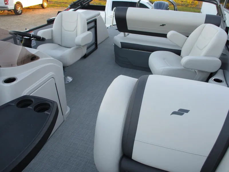 Slide: The Image of 2024 Starcraft EXS 1 Q DH pontoon boat interior with luxurious seating. - 14