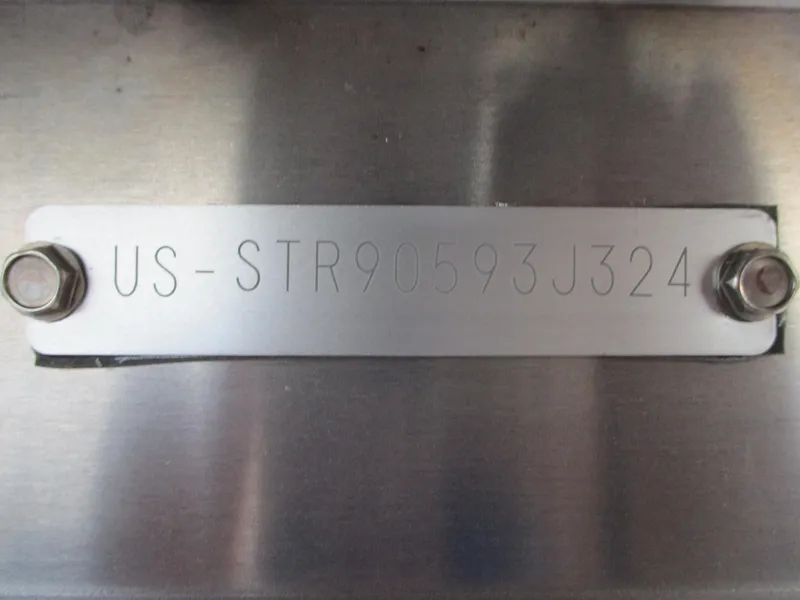 Slide: The Image of 2024 Starcraft EXS 1 Q DH serial number plate. - 23