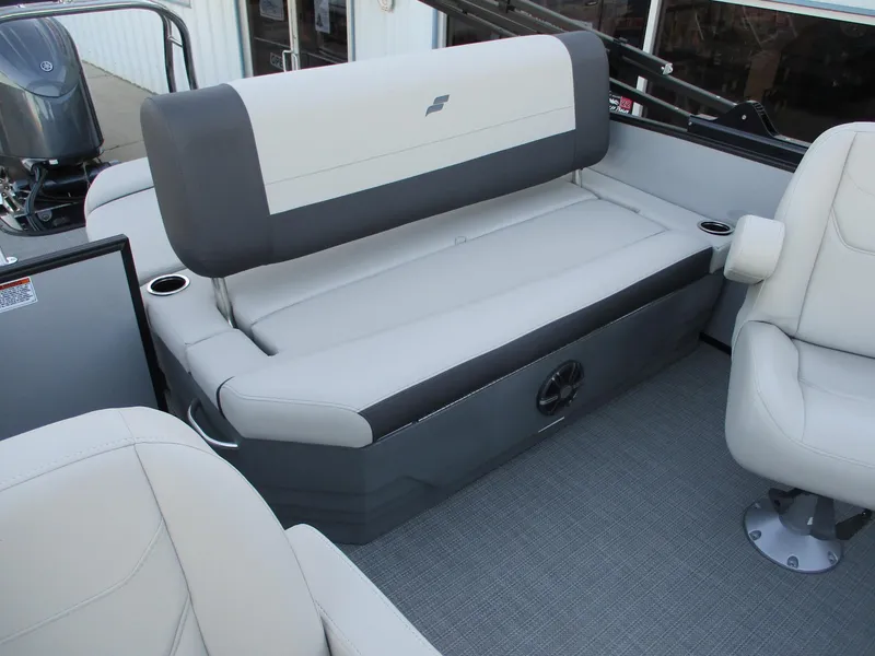 Slide: The Image of 2024 Starcraft EXS 1 Q DH boat interior with comfortable seating and cup holders. - 9