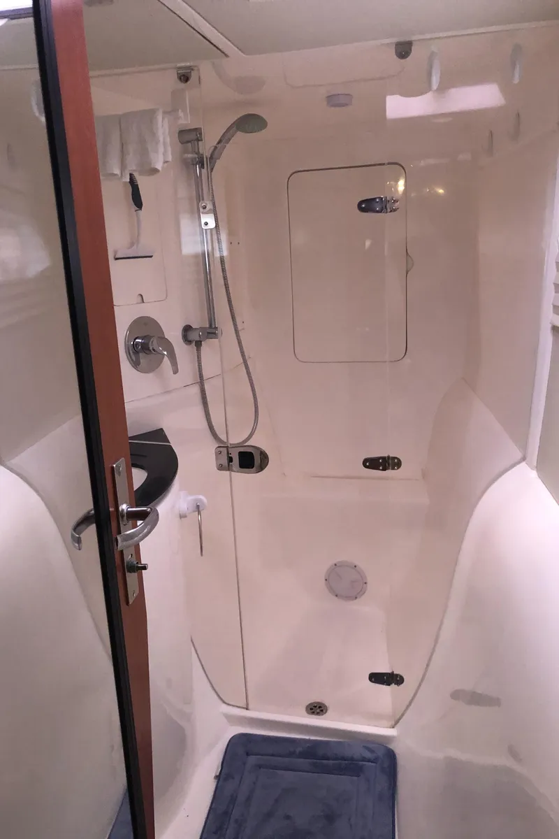 Slide: The Image of 2013 Leopard 39 Owner's Version yacht bathroom with shower and modern fixtures. - 31