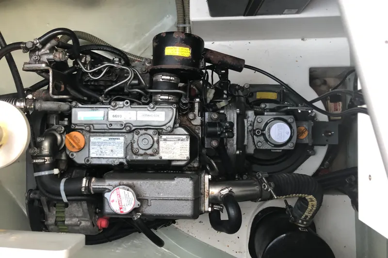 Slide: The Image of Engine compartment of a 2013 Leopard 39 Owner's Version catamaran, showcasing mechanical components. - 37