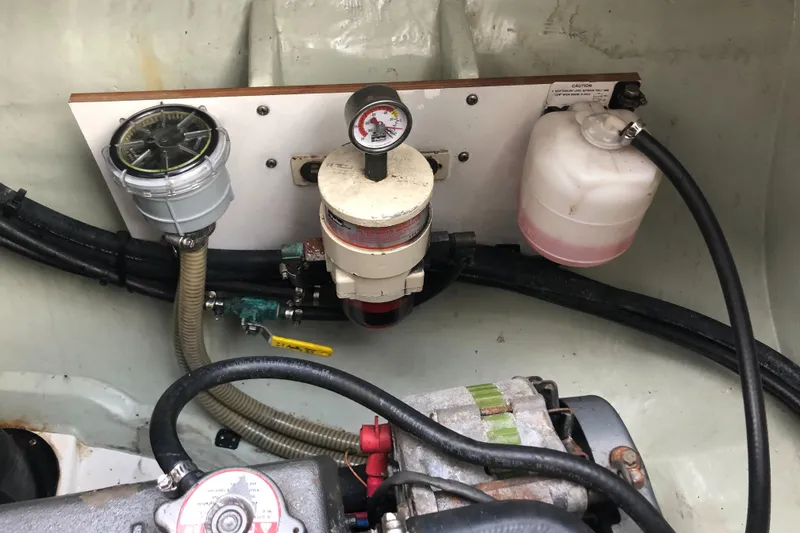 Slide: The Image of Engine compartment of a 2013 Leopard 39 Owner's Version with fuel filter and gauge. - 40