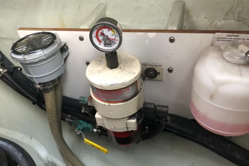 Slide: The Image of Engine room of 2013 Leopard 39 Owner's Version with gauge and fluid container. - 41