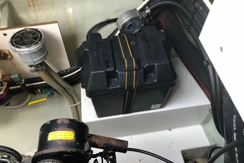 Slide: The Image of Battery compartment in a 2013 Leopard 39 Owner's Version yacht engine room. - 42