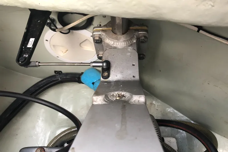 Slide: The Image of 2013 Leopard 39 Owner's Version yacht steering mechanism, showcasing detailed components and cables. - 44