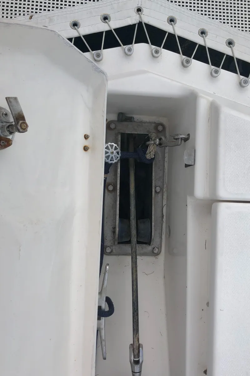 Slide: The Image of 2013 Leopard 39 Owner's Version yacht compartment with visible rigging and hardware. - 8