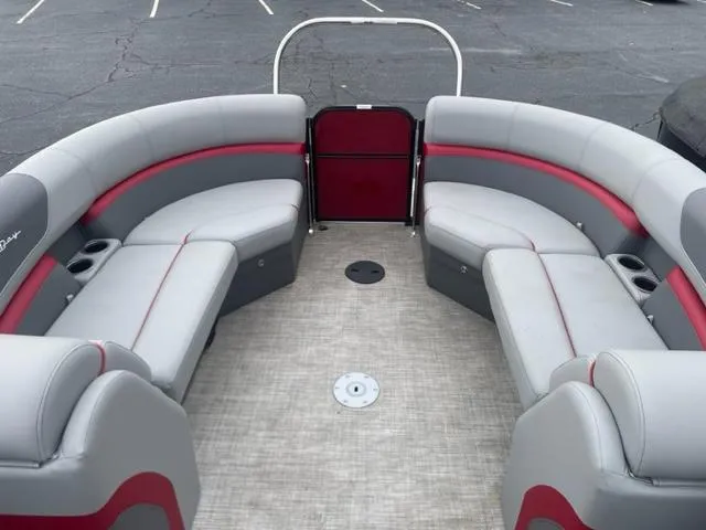Slide: The Image of 2023 South Bay 224 RS 3.0 pontoon boat with spacious seating and modern design. - 6