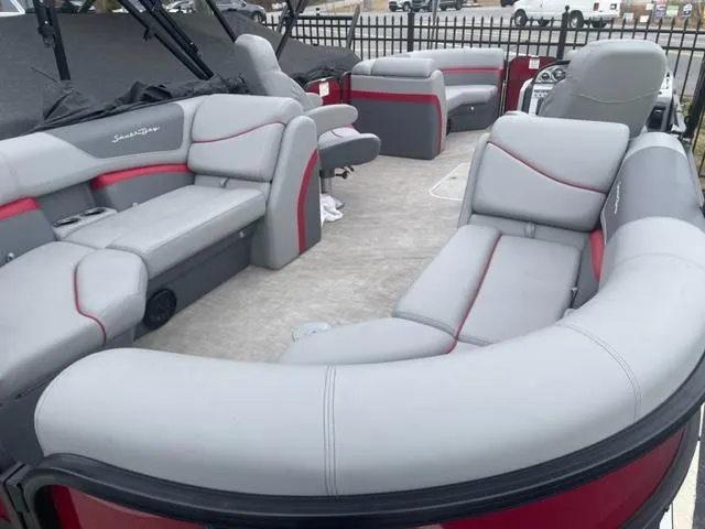 Slide: The Image of 2023 South Bay 224 RS 3.0 pontoon boat with spacious seating and modern design. - 9