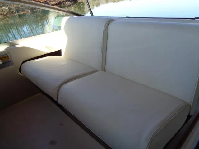 Slide: The Image of 1986 Sea Ray 250 Sundancer boat interior seating. - 10