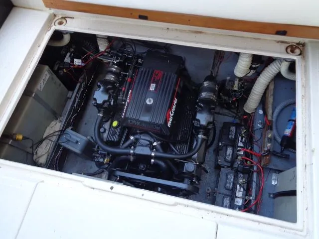 Slide: The Image of Engine compartment of a 1986 Sea Ray 250 Sundancer boat. - 15