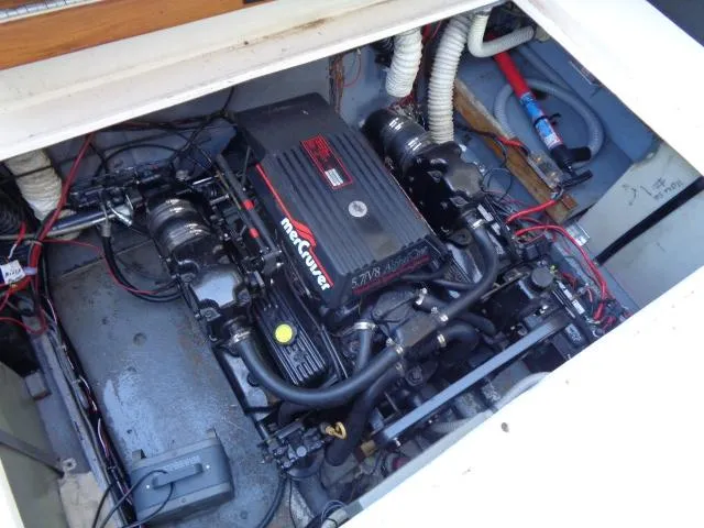 Slide: The Image of Engine compartment of a 1986 Sea Ray 250 Sundancer with MerCruiser engine. - 16