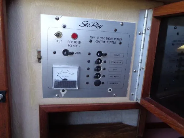 Slide: The Image of Sea Ray 250 Sundancer 1986 shore power control center panel. - 9
