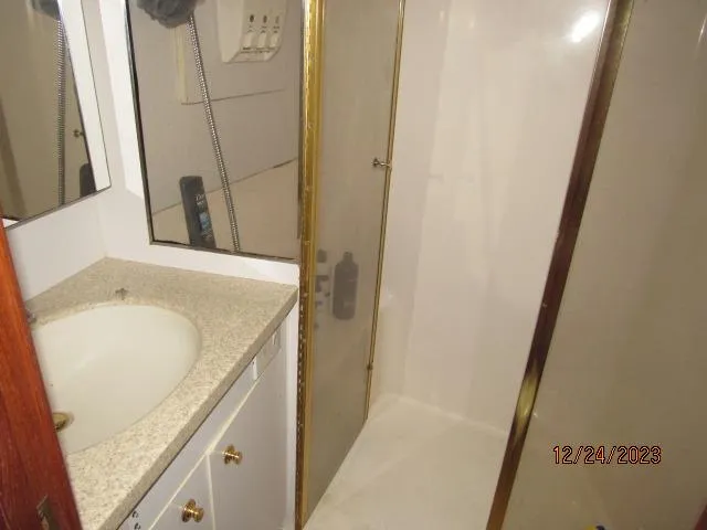 Slide: The Image of 2001 Ocean Yachts Super Sport bathroom with sink and shower - 8