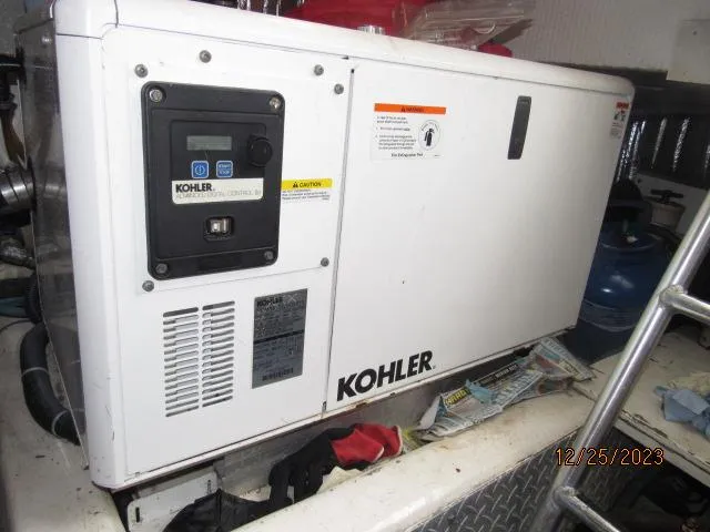 Slide: The Image of Kohler generator in a 2001 Ocean Yachts Super Sport boat. - 24