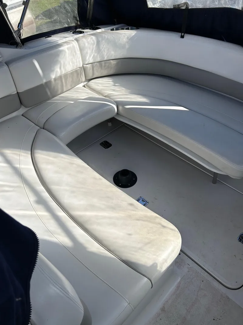 Slide: The Image of 2000 Four Winns 268 Vista boat interior with white seating - 6