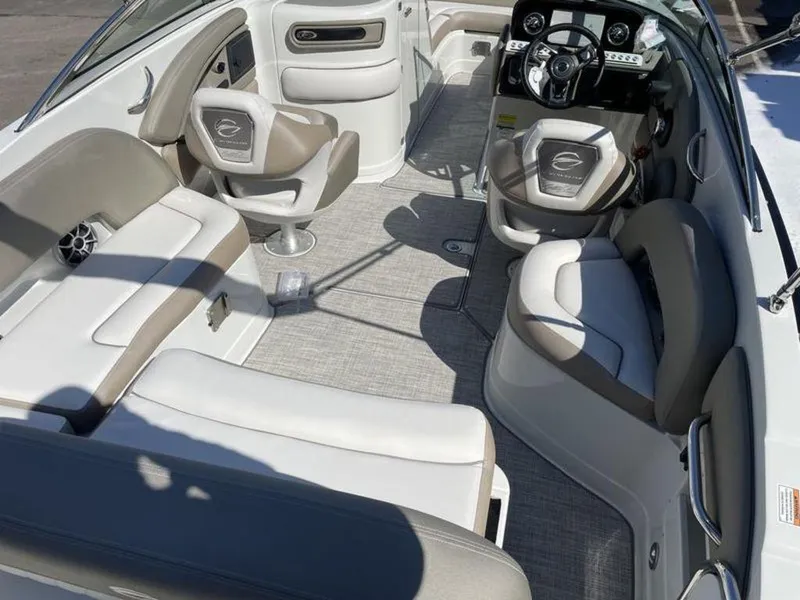 Slide: The Image of 2023 Crownline Eclipse E 235 boat interior with seating and steering console. - 4