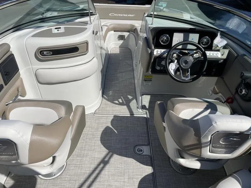 Slide: The Image of 2023 Crownline Eclipse E 235 boat interior with helm and seating. - 6
