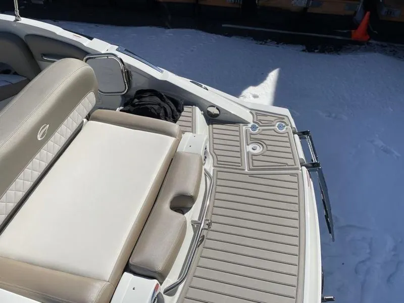 Slide: The Image of 2023 Crownline Eclipse E 235 boat with spacious seating and swim platform. - 9